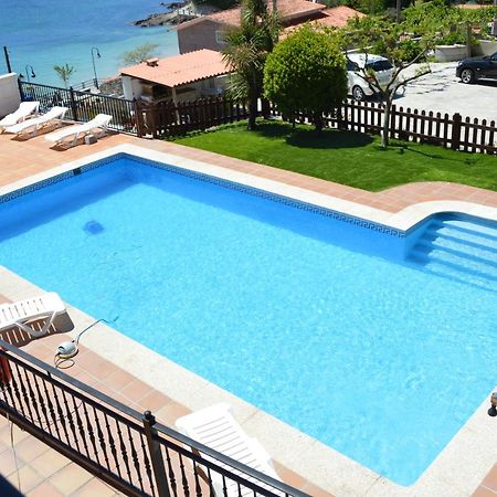 Apartamentos Sinas Playa Raxo Eksteriør bilde