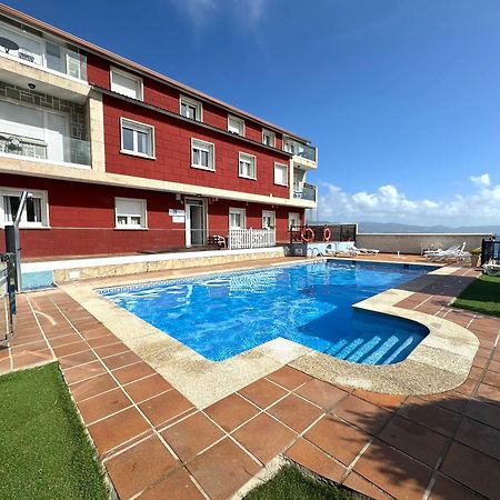 Apartamentos Sinas Playa Raxo Eksteriør bilde