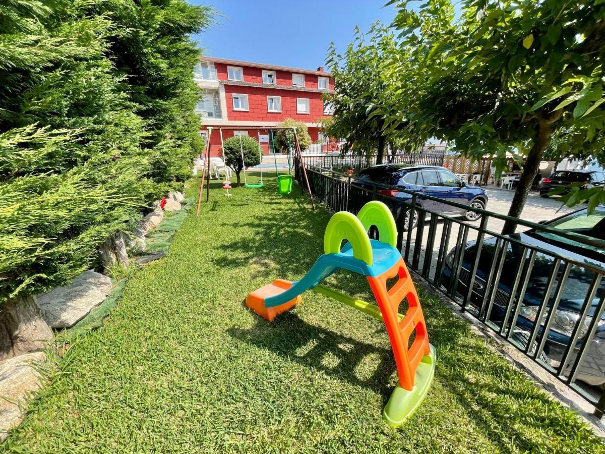 Apartamentos Sinas Playa Raxo Eksteriør bilde