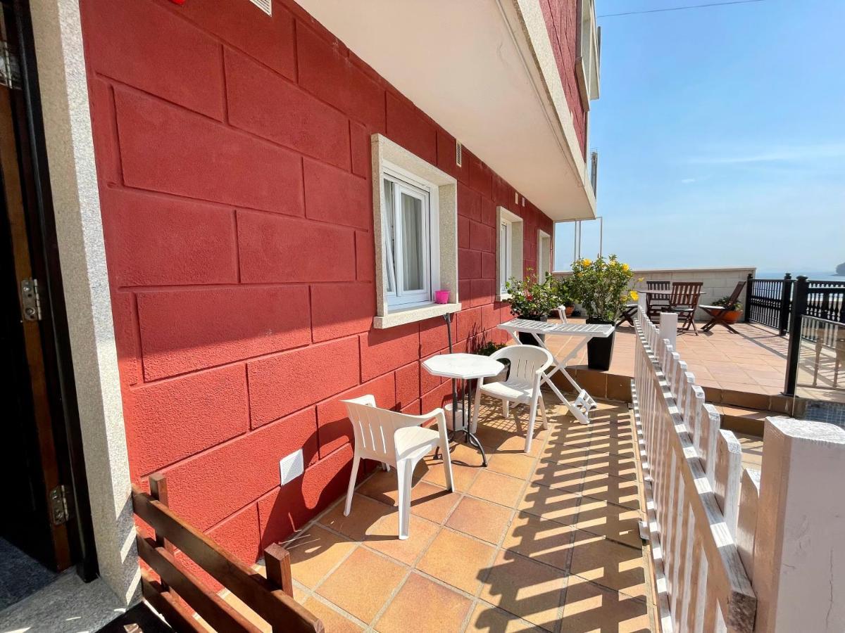 Apartamentos Sinas Playa Raxo Eksteriør bilde