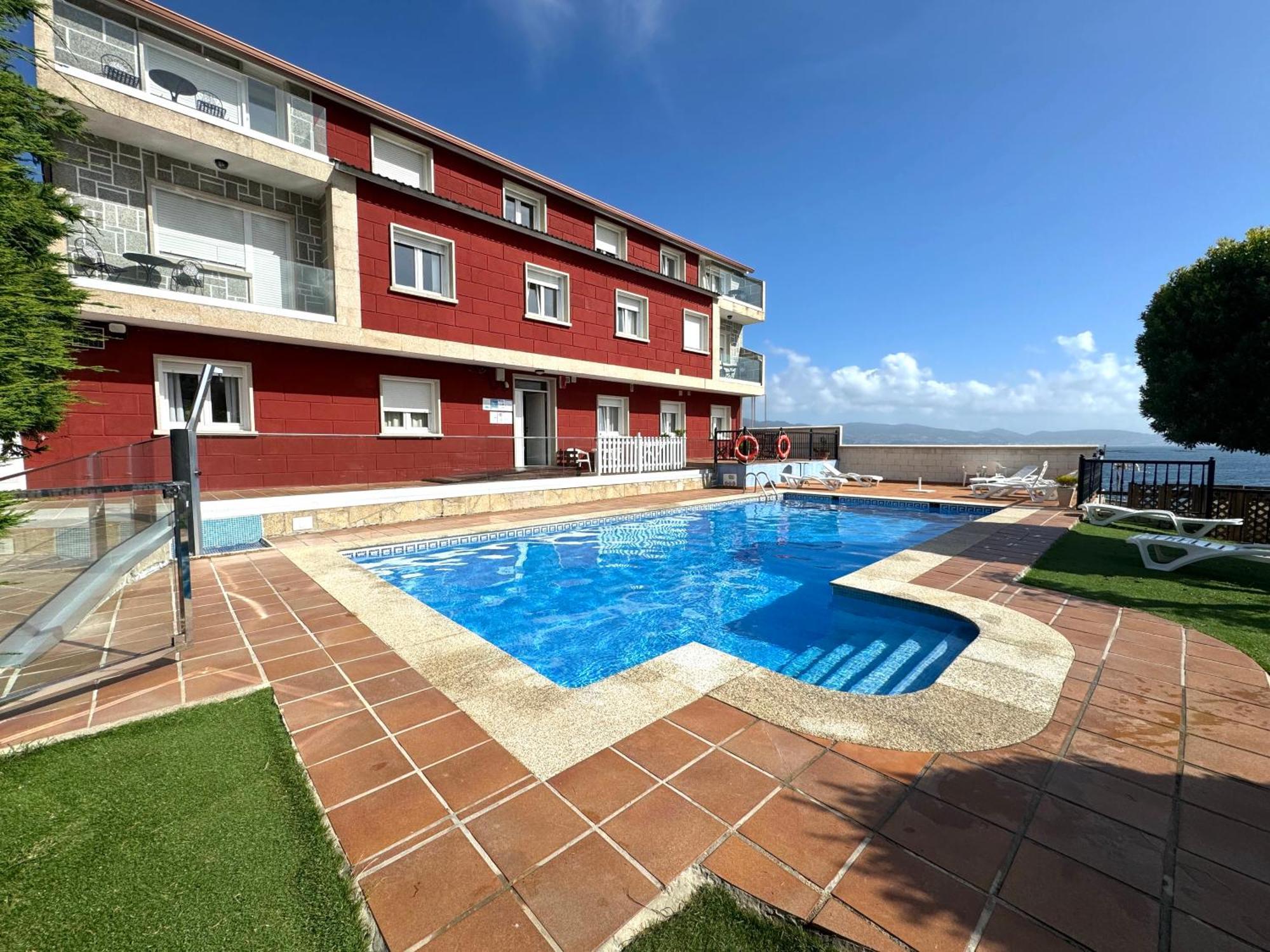 Apartamentos Sinas Playa Raxo Eksteriør bilde