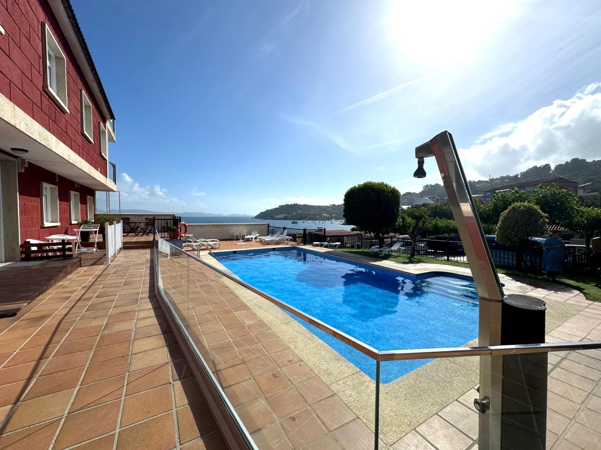 Apartamentos Sinas Playa Raxo Eksteriør bilde