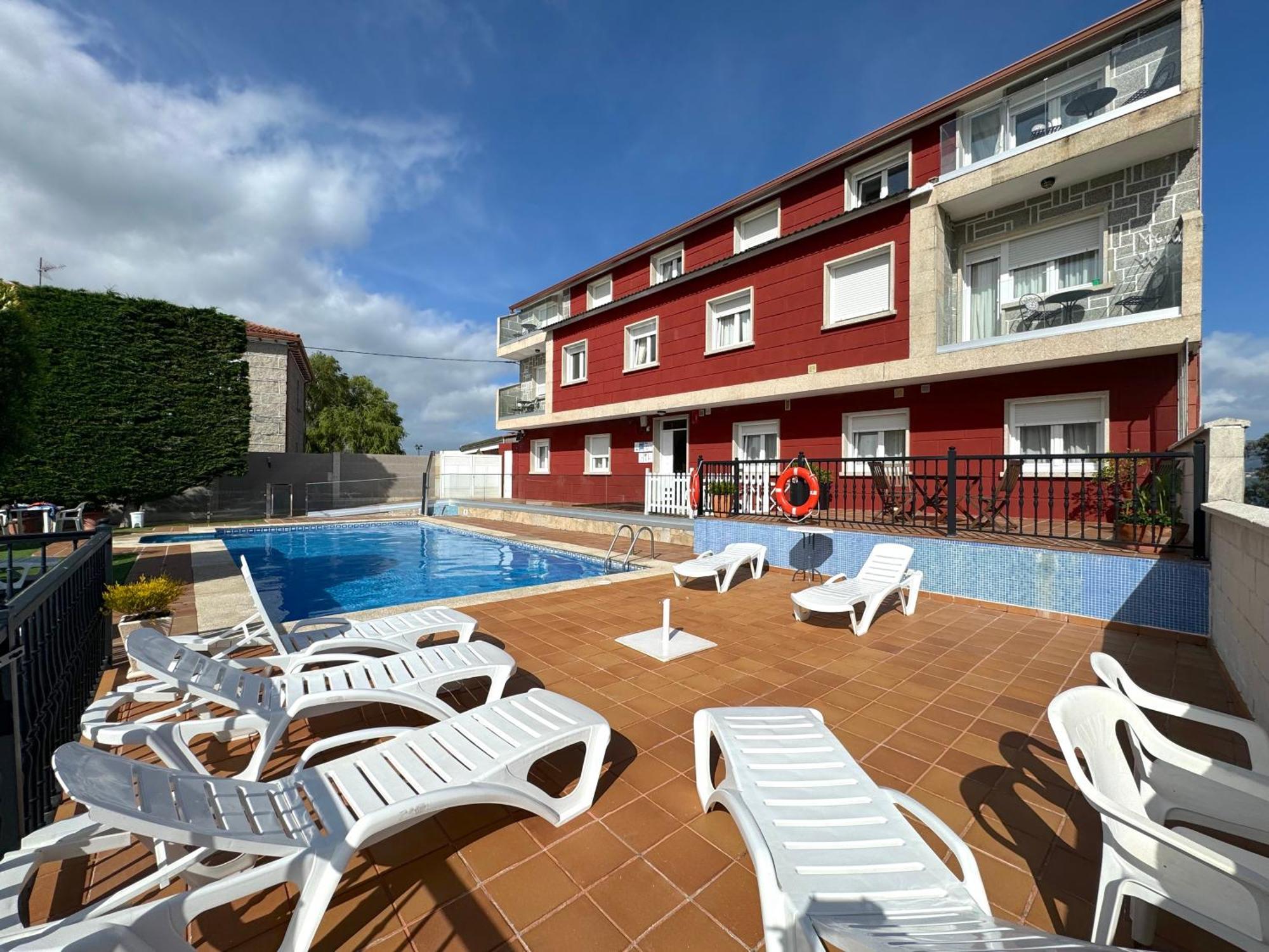 Apartamentos Sinas Playa Raxo Eksteriør bilde