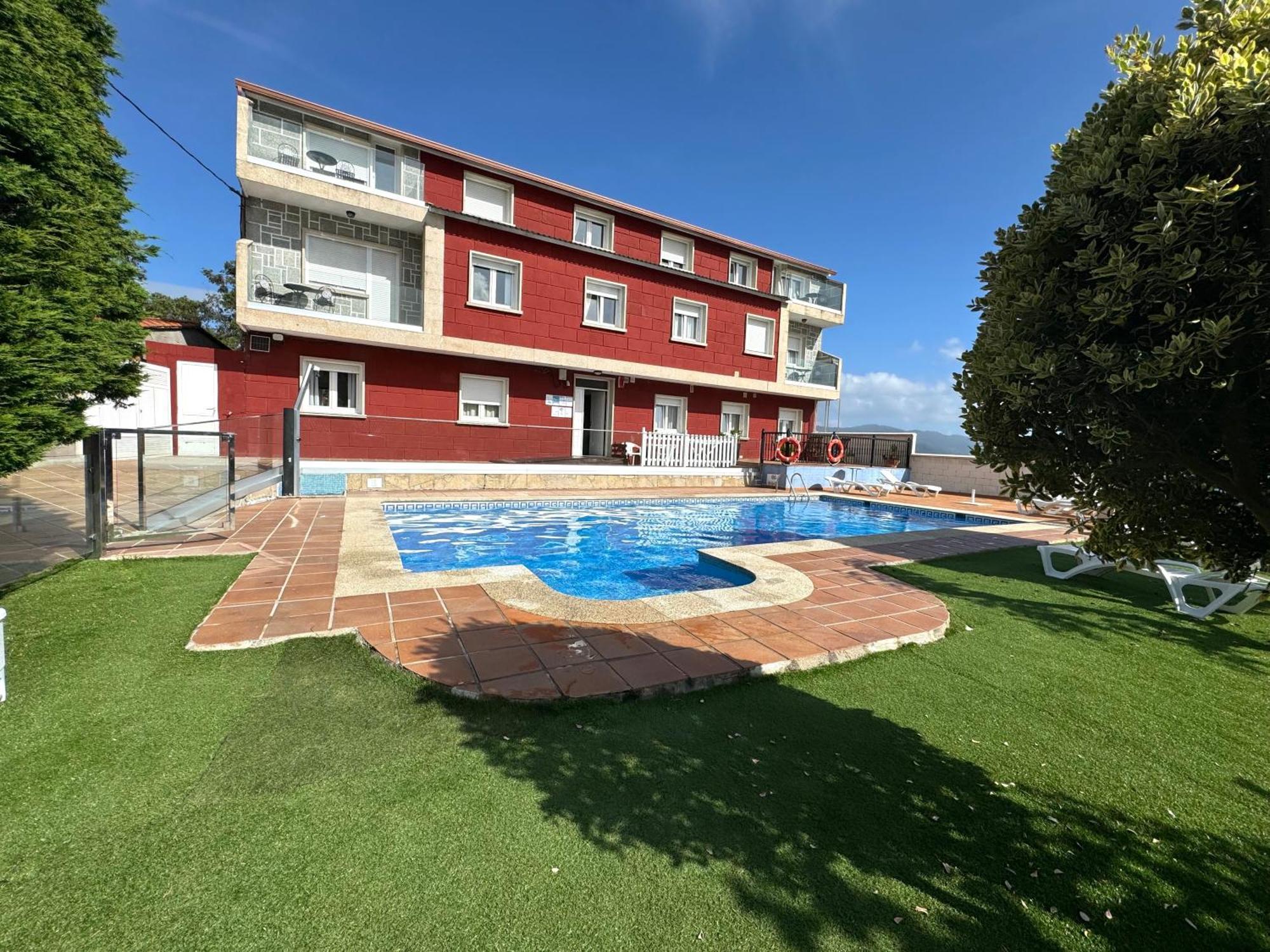 Apartamentos Sinas Playa Raxo Eksteriør bilde