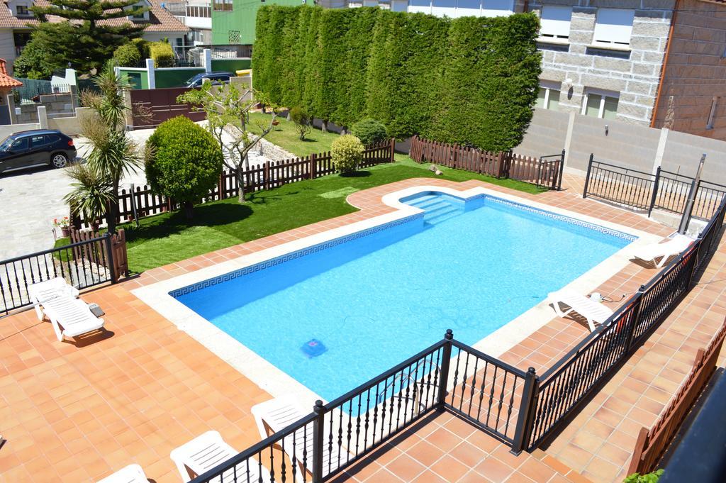 Apartamentos Sinas Playa Raxo Eksteriør bilde
