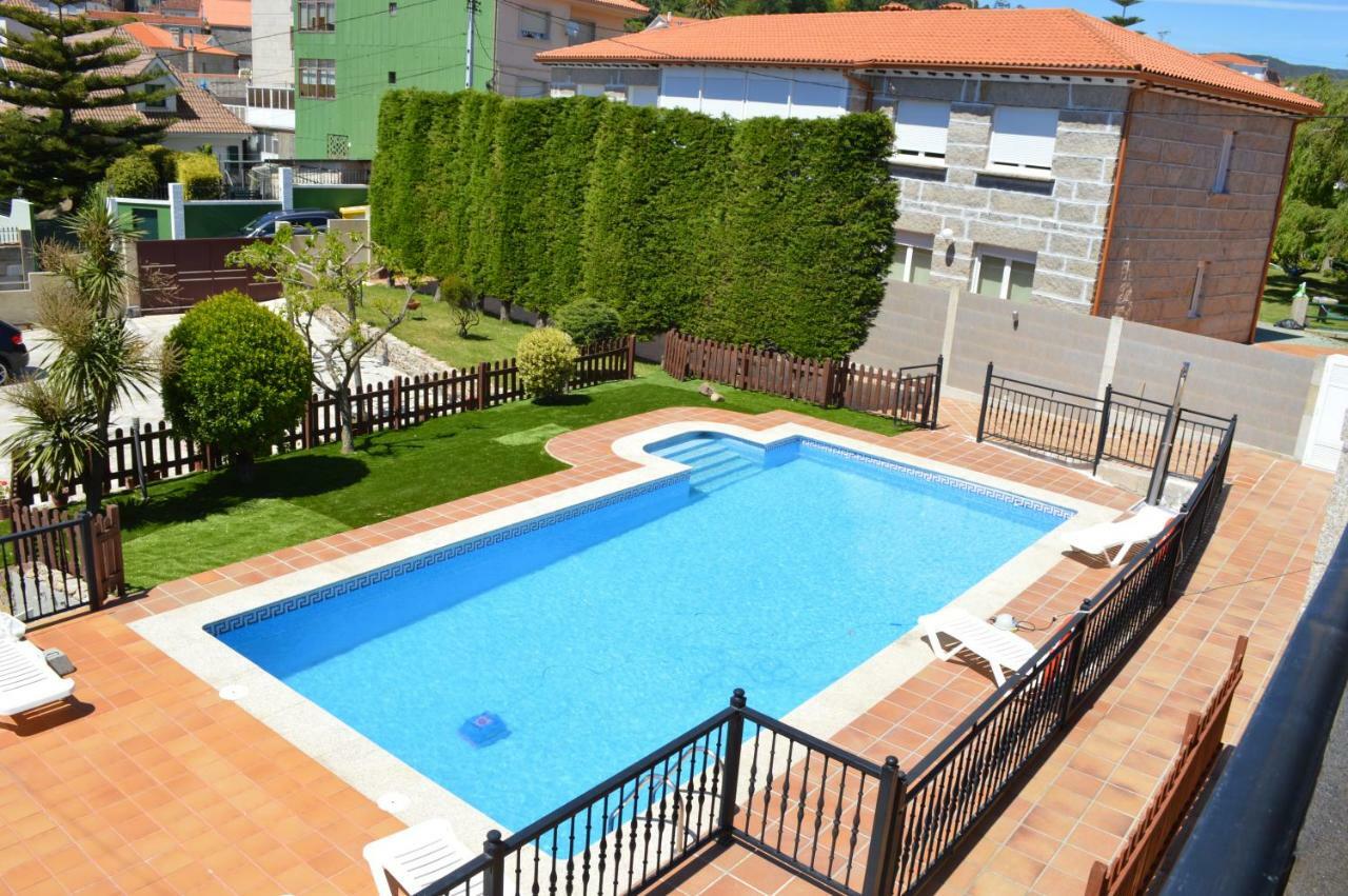 Apartamentos Sinas Playa Raxo Eksteriør bilde